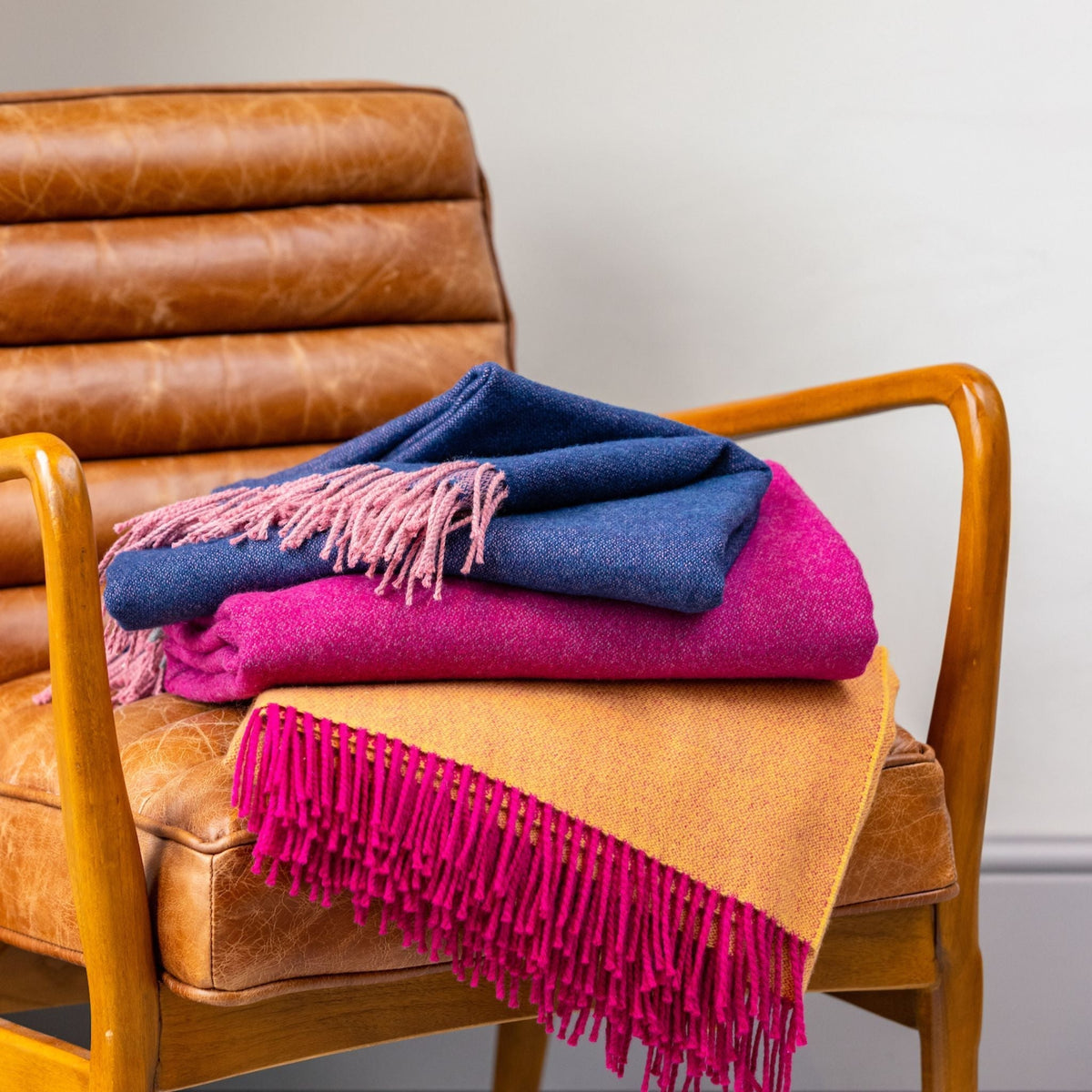 Home Comforts Throw in Ochre Yellow/Cerise Pink