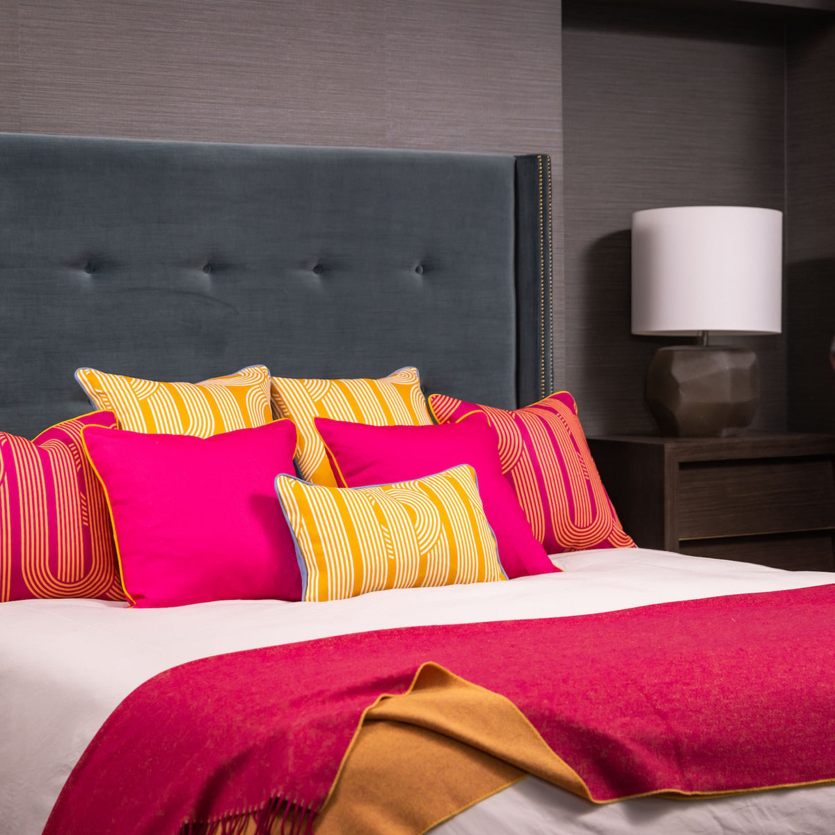 Home Comforts Throw in Ochre Yellow/Cerise Pink