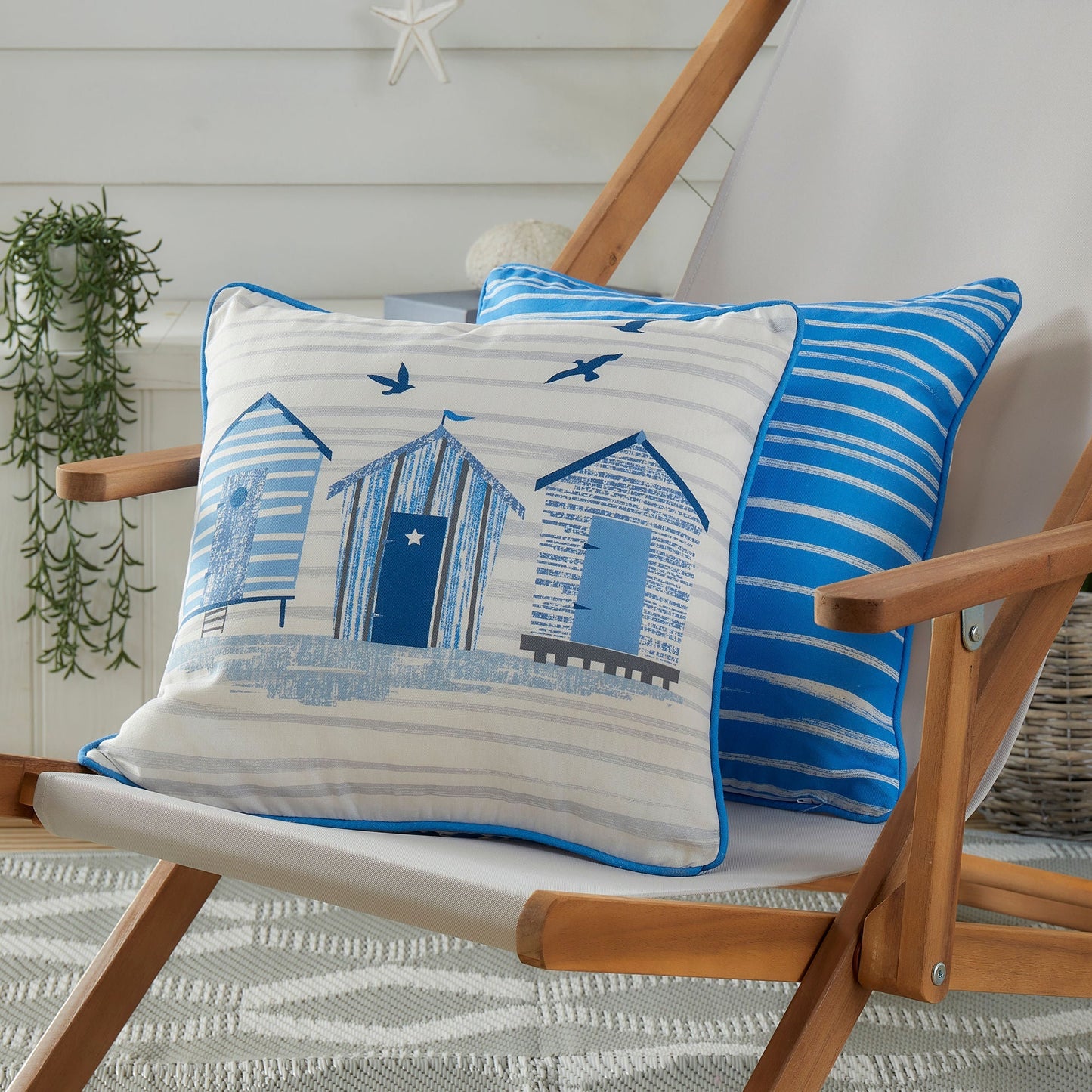 Beach Huts Outdoor Cushion in Blue