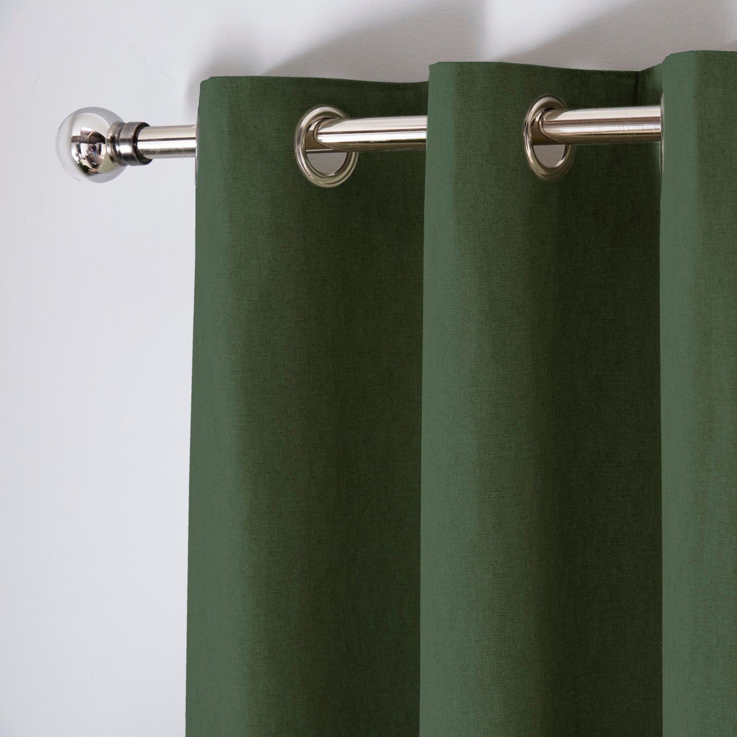 Cannes Eyelet Curtains in Bottle Green