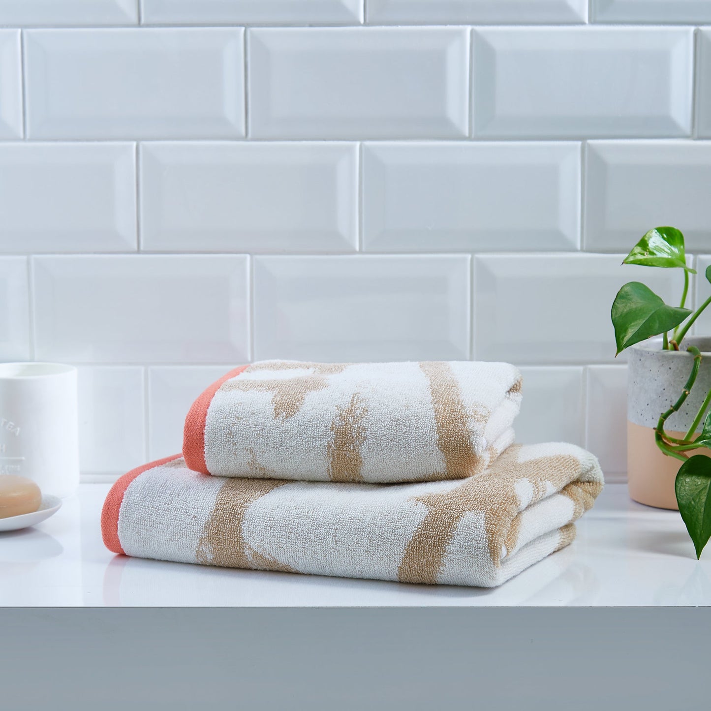 Leda Towels in Natural/Coral
