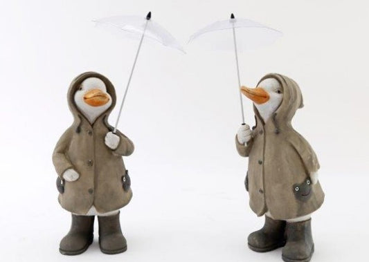 Duck With Coat & Umbrellas